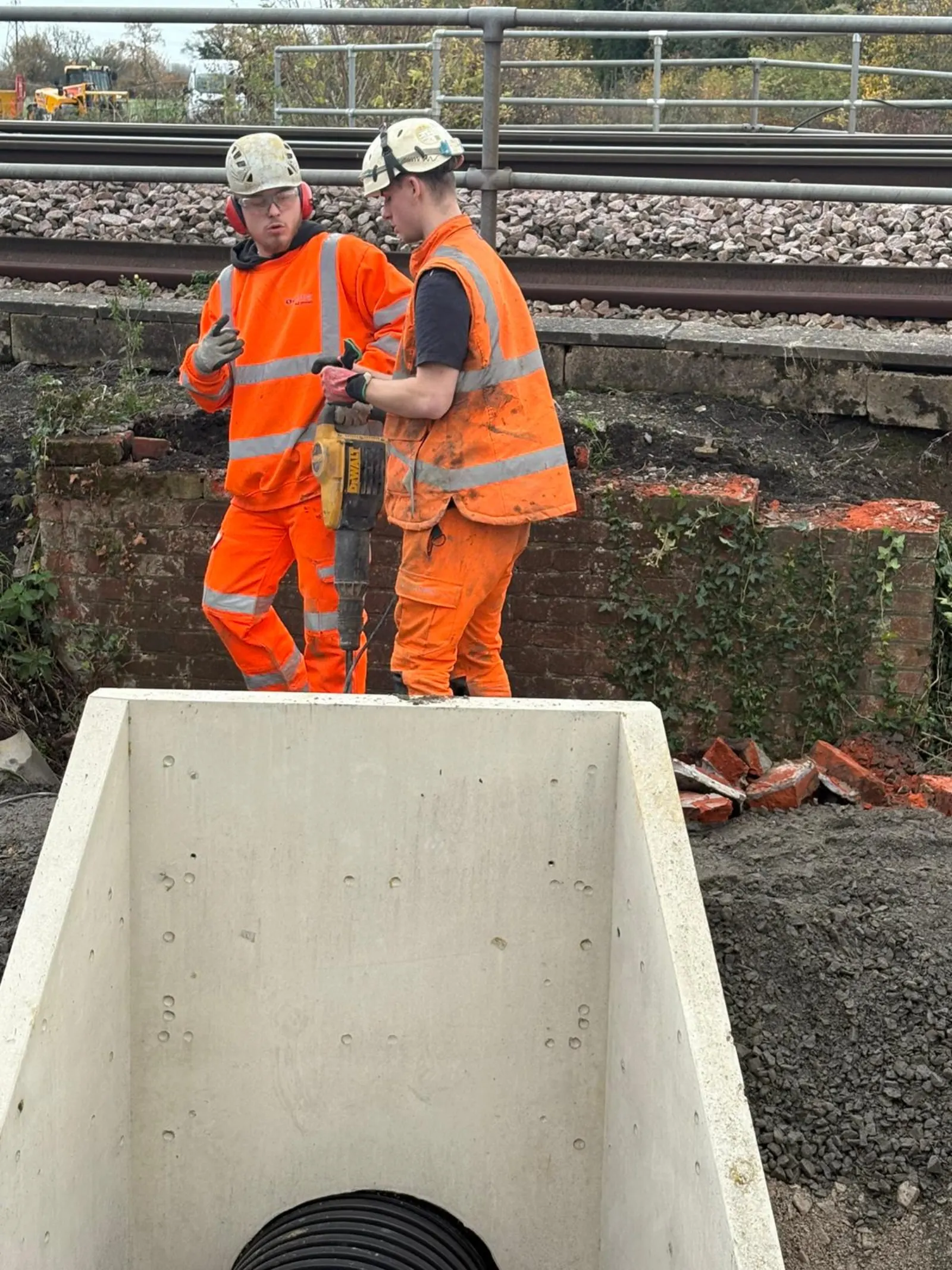 Concrete headwall works supporting drainage infrastructure