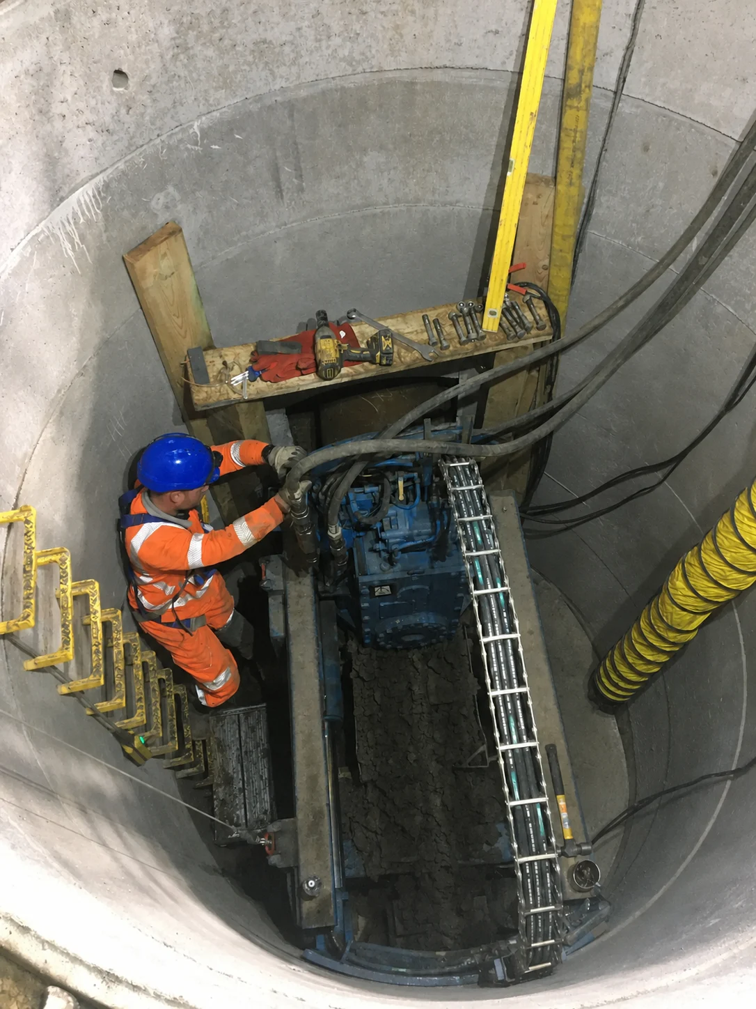 Guided augering equipment used from a prepared working area