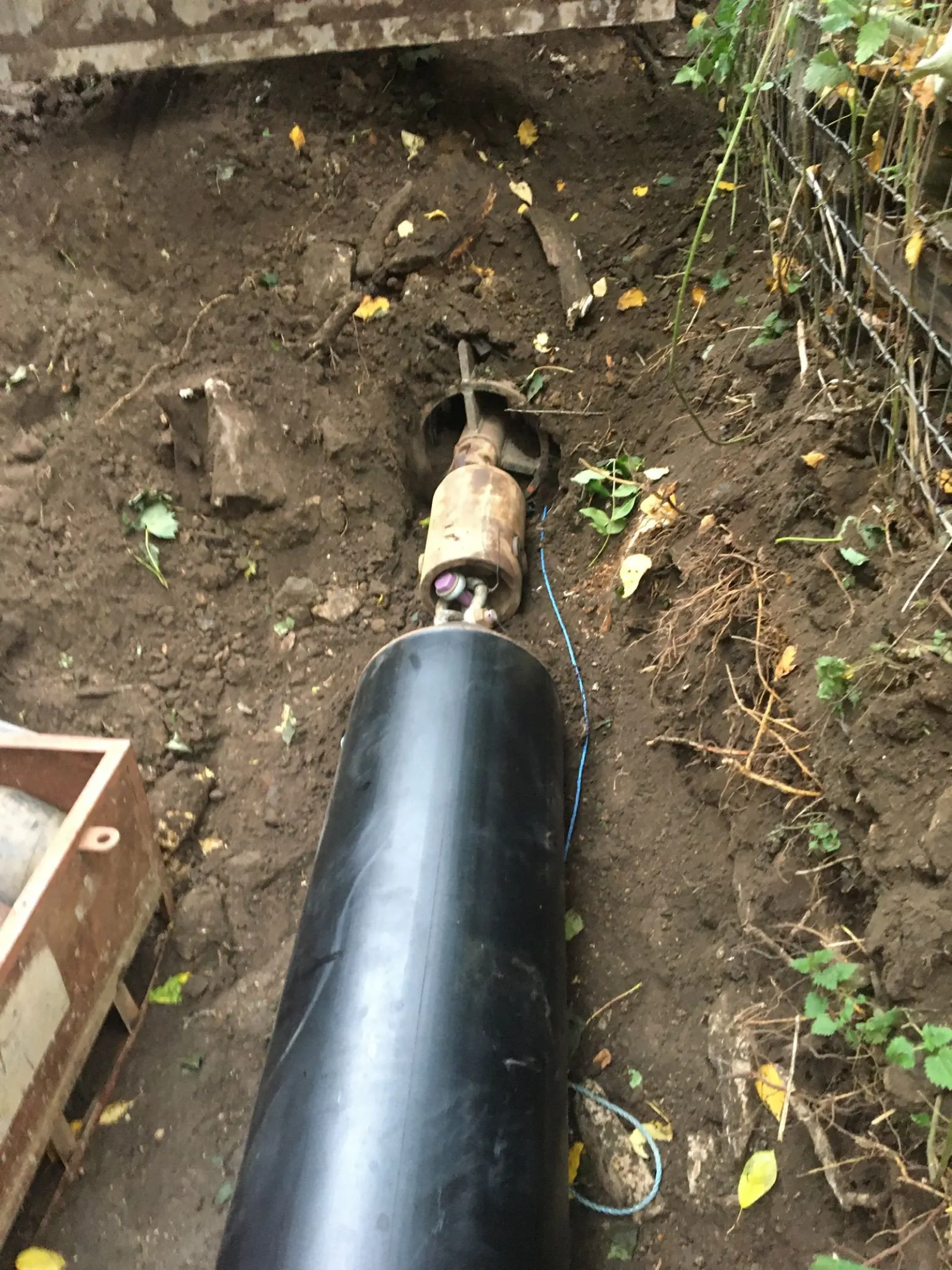 Pipe bursting equipment set up for trenchless replacement works